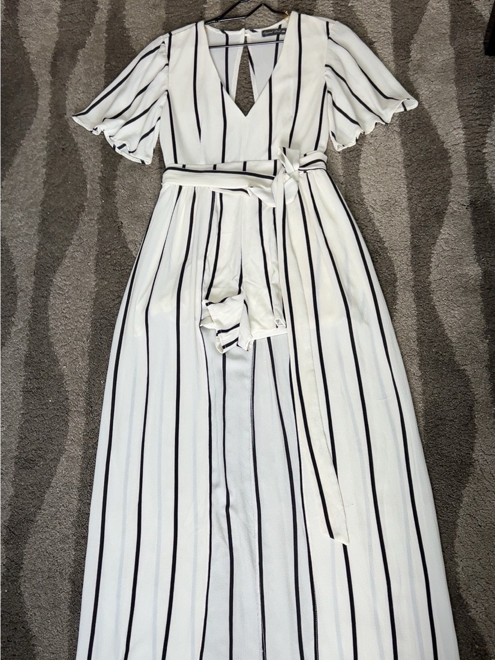 Striped White and Black V-Neck Wrap Jumpsuit